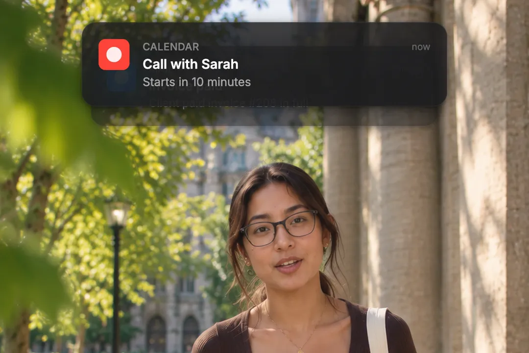 A creator talking to camera with two iOS-style notifications stacked: Call with Sarah on top of Invoice paid